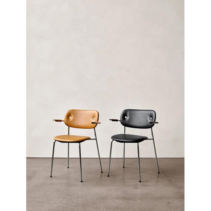 Cozy Minimalist Black Leather and Chrome Dining Chair with Armrests