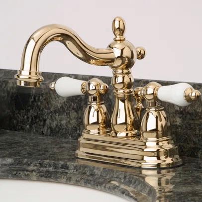 Kingston Brass Heritage Two-Handle 3-Hole Deck Mount 4" Centerset Bathroom Faucet with Plastic Pop-Up