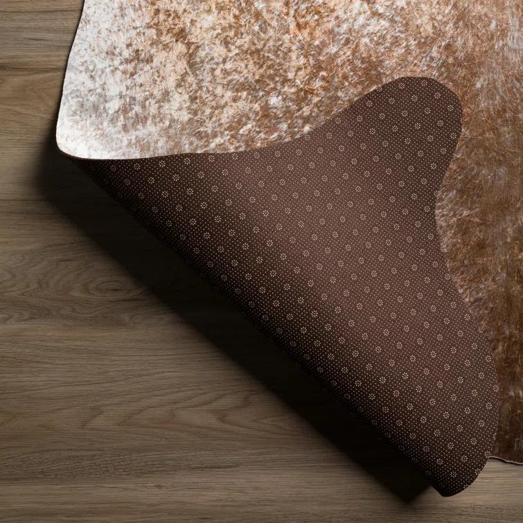 Albury Animal Print Brown Area Rug