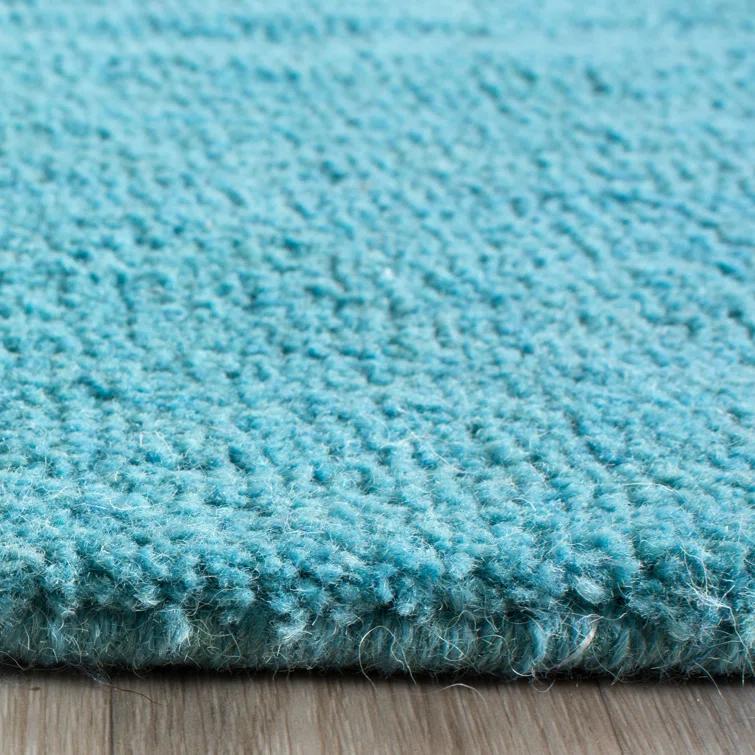 Moreau Hand Tufted Wool Solid Color Rug