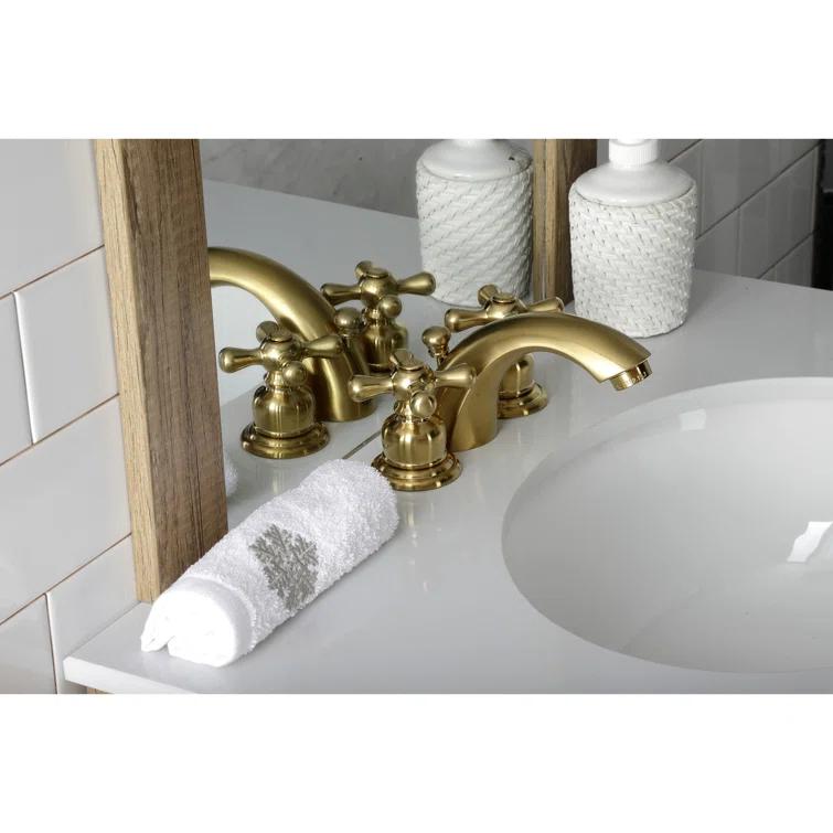 Kingston Brass Victorian Two-Handle 3-Hole Deck Mount Mini-Widespread Bathroom Faucet with Plastic Pop-Up