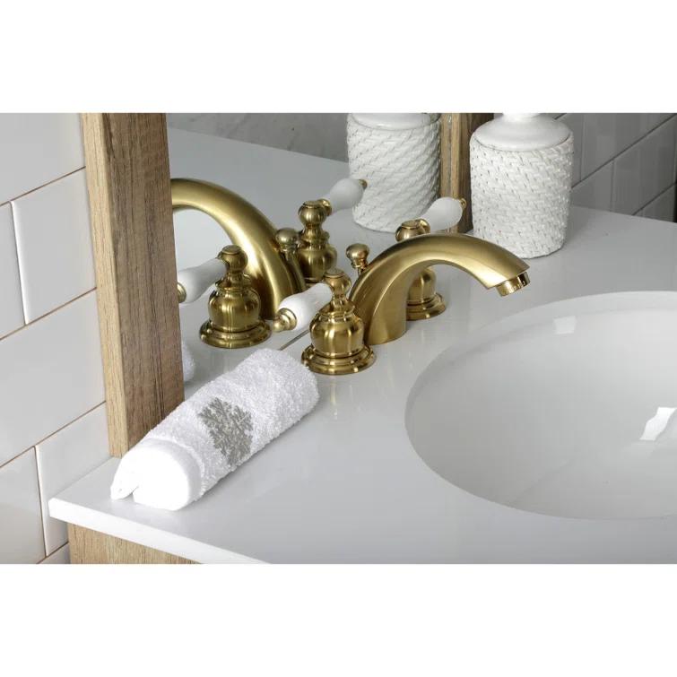 Kingston Brass Victorian Two-Handle 3-Hole Deck Mount Mini-Widespread Bathroom Faucet with Plastic Pop-Up