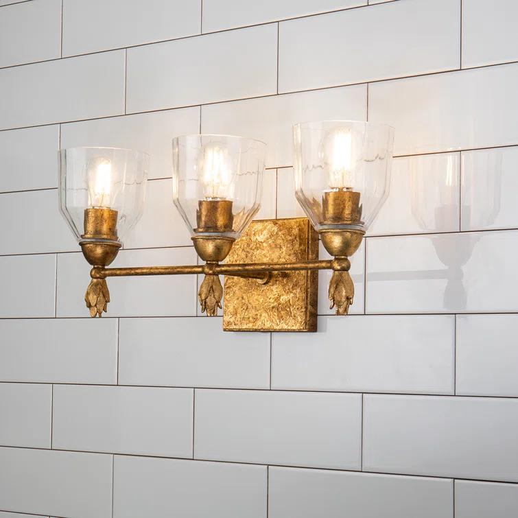 Lucas McKearn Felice 3-light Flame-shaped Bath Vanity Light in Antique Gold