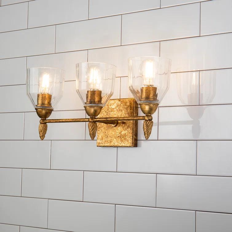 Regal Elegance 3-Light Gold Vanity Light with Clear Glass Shades