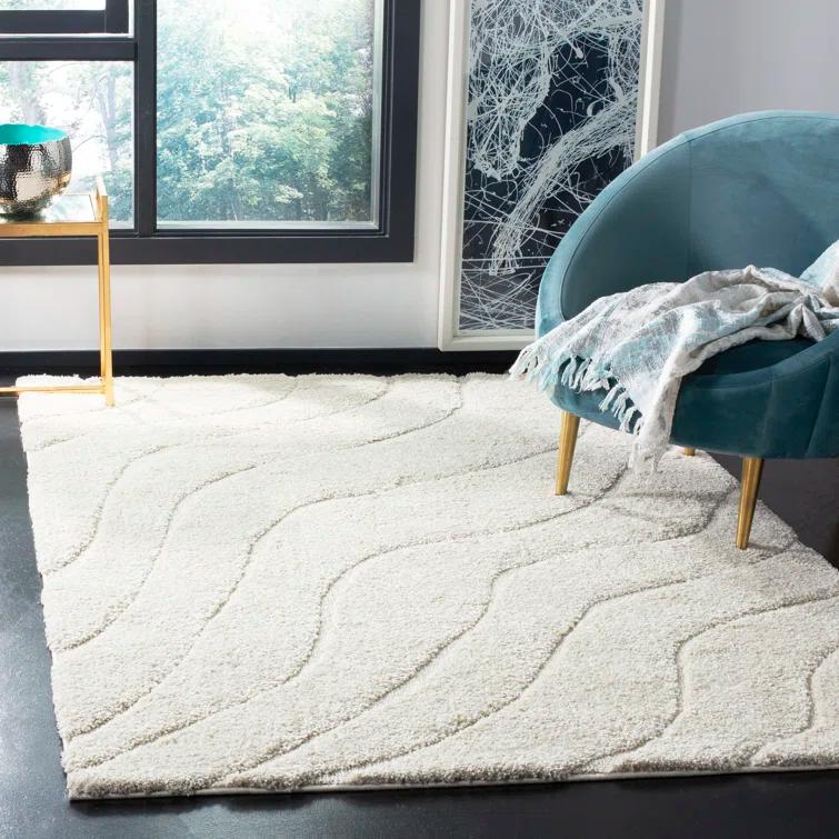 Ashal Abstract Cream Area Rug