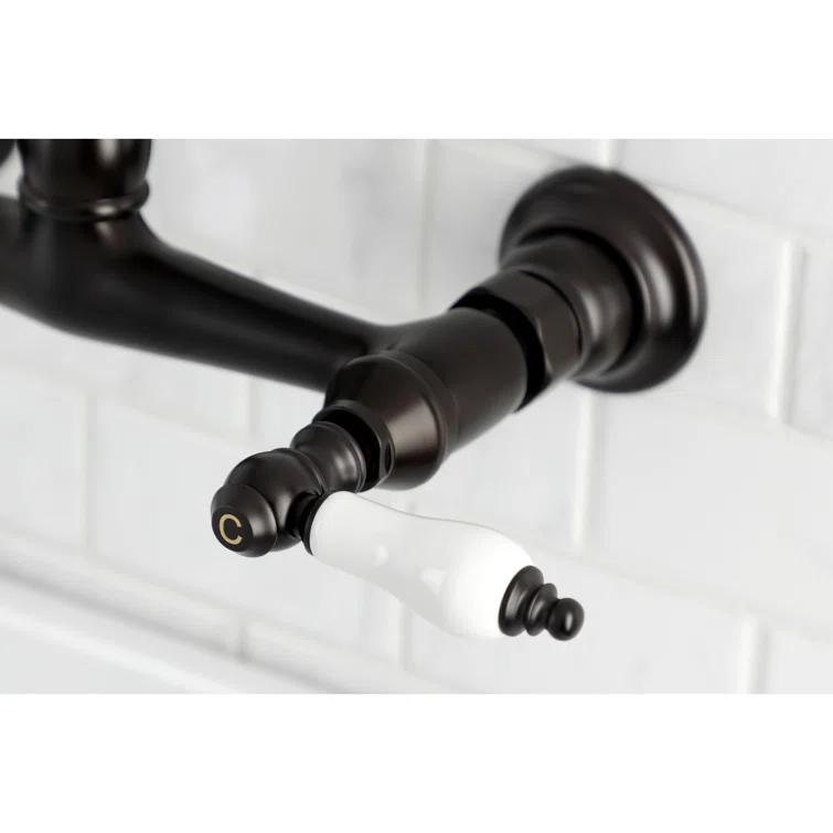 Kingston Brass Vintage Two-Handle 2-Hole Wall Mount Bathroom Faucet