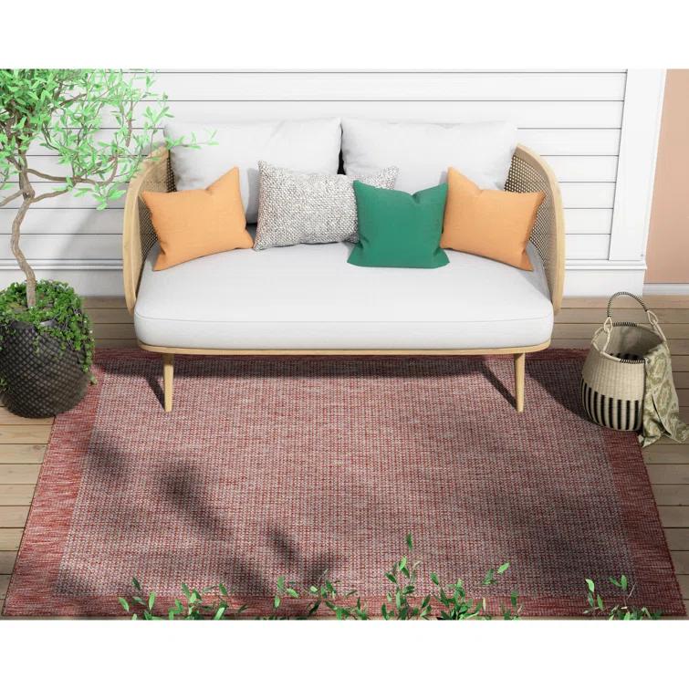 Marshanna Odin Solid Striped Border Indoor Outdoor Coral Flatweave Rug