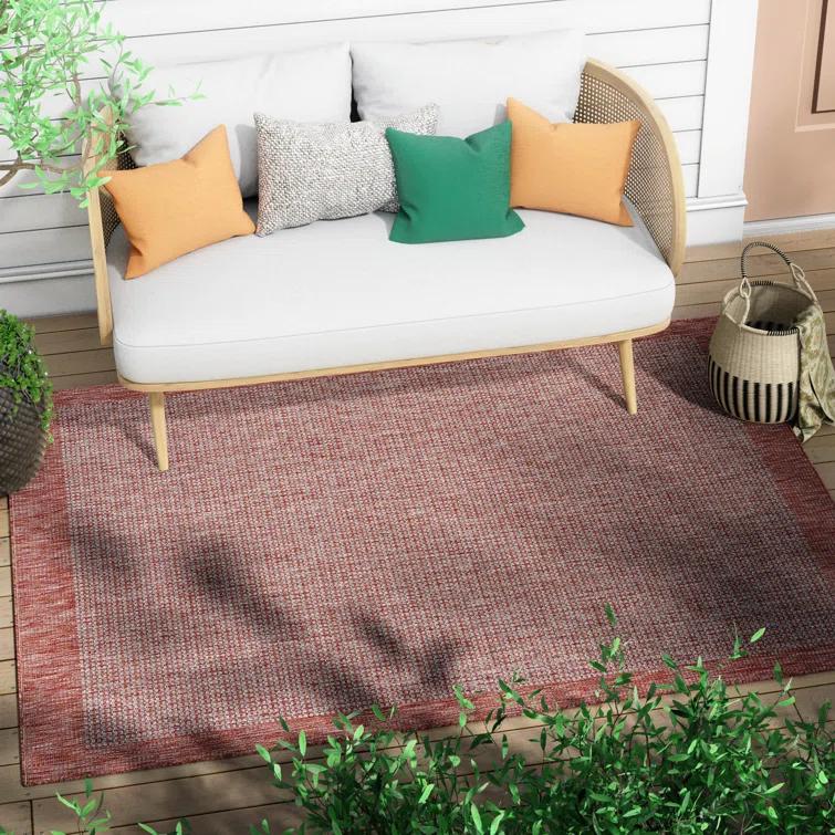 Marshanna Odin Solid Striped Border Indoor Outdoor Coral Flatweave Rug