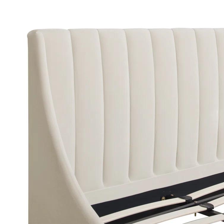 Afraa Upholstered Wingback Bed