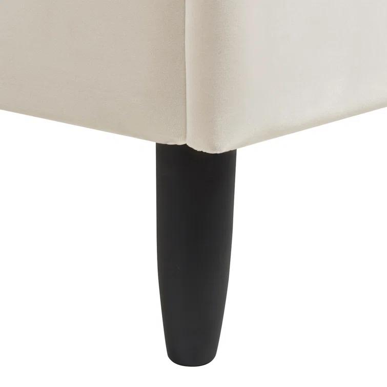 Afraa Upholstered Wingback Bed