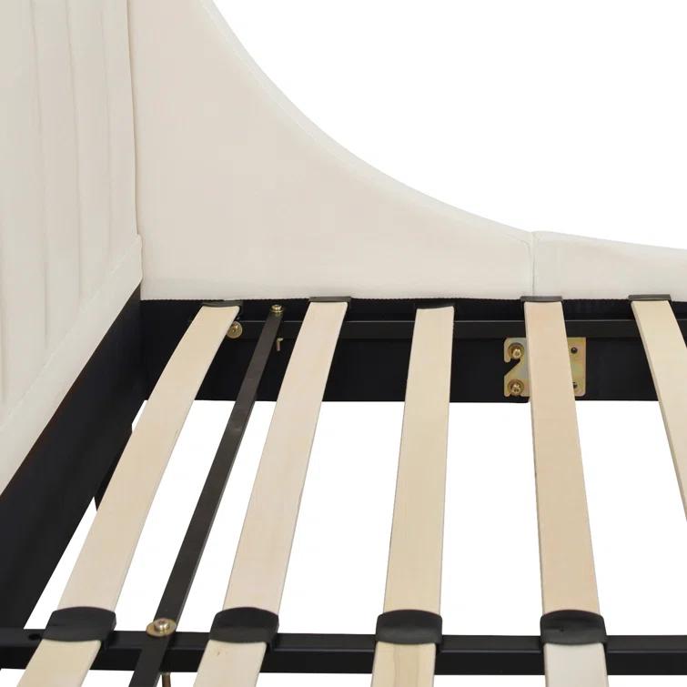 Afraa Upholstered Wingback Bed