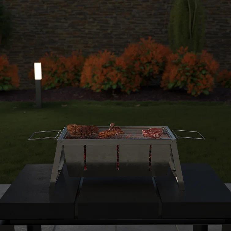 Fire Sense Foldaway Charcoal Grill, Stainless Steel ,Charcoal Grate & Carry Bag Included