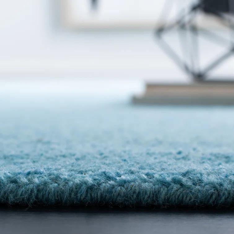 Moreau Hand Tufted Wool Solid Color Rug