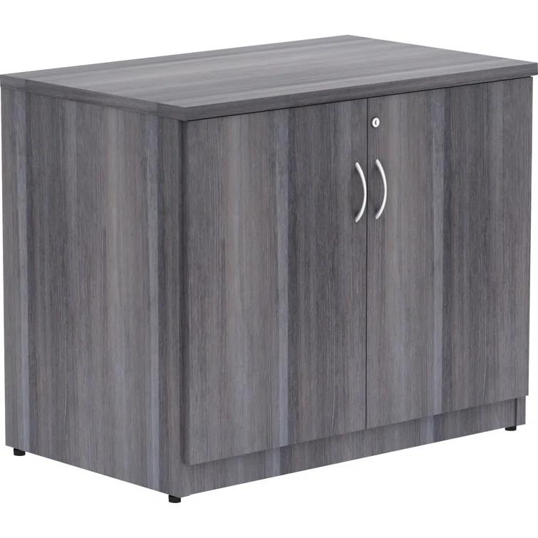 Essentials Series 2-Door Storage Cabinet - 36" X 22.5" X 29.5" - Drawer(S)2 Door(S) - Material: Melamine Faced Chipboard (MFC) Top, Melamine Faced Chipboard (MFC) Shelf, Melamine Faced Chipboard (MFC) Side Panel, Melamine Panel - Finish: Weathered Charcoa