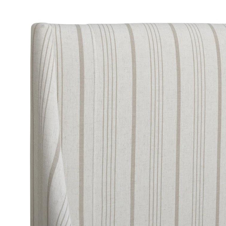 Afraa Upholstered Wingback Bed