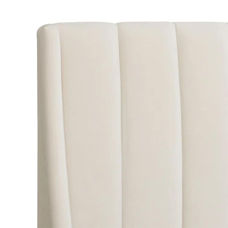 Afraa Upholstered Wingback Bed
