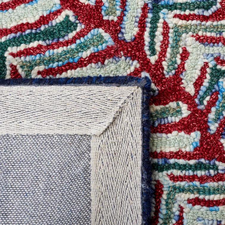 Chaitra Hand Tufted Wool Floral Rug