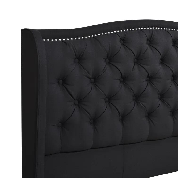 Coleman Upholstered Wingback Bed