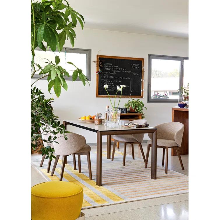 Tuka Upholstered Armchair with Wooden Frame