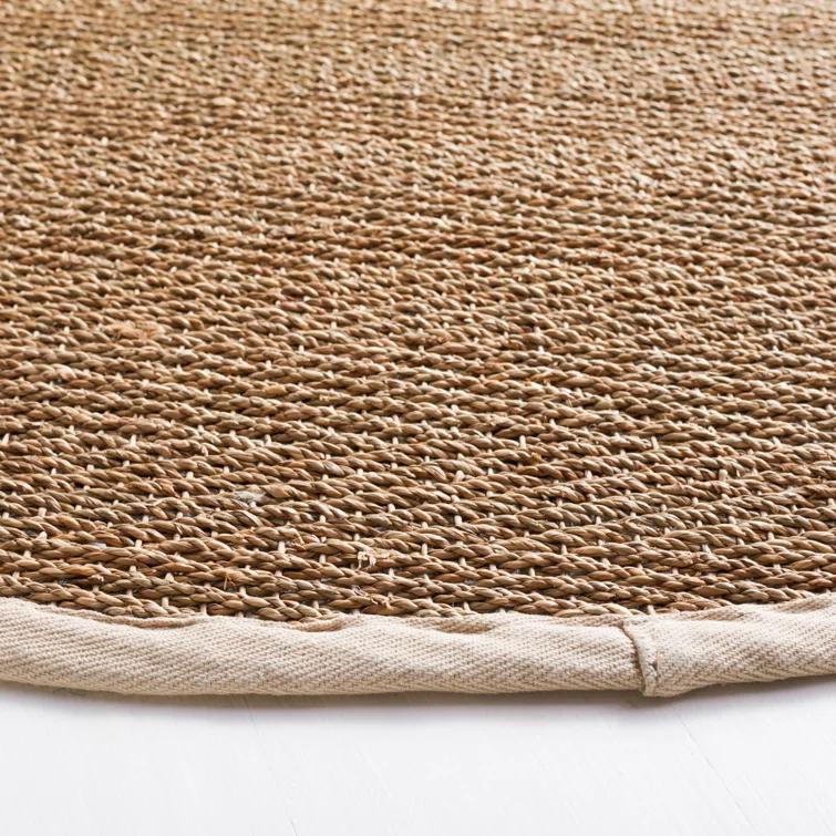 Deschamps Natural Fiber Seagrass Solid Color Rug