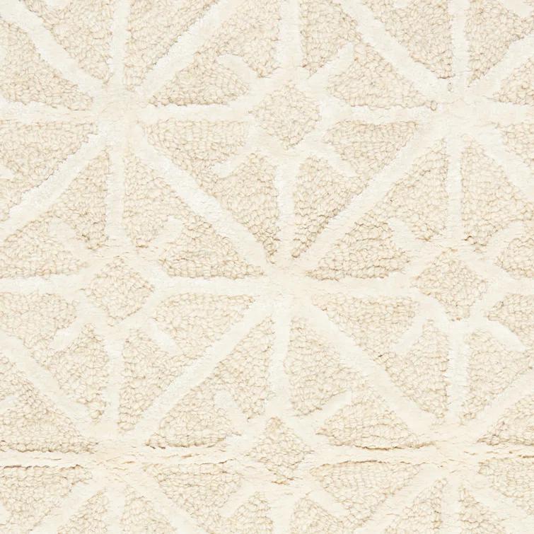 Geometric Handmade Tufted Ivory Area Rug