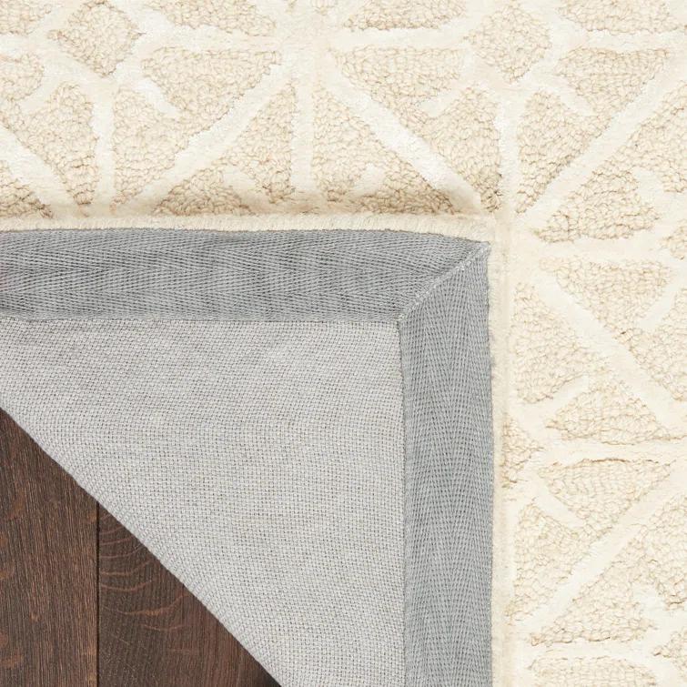 Geometric Handmade Tufted Ivory Area Rug