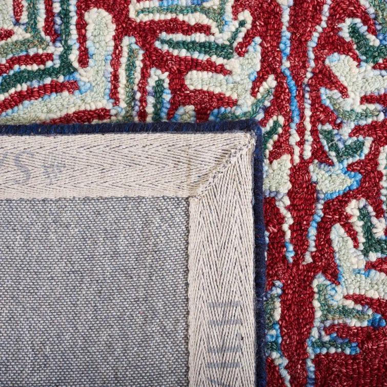 Chaitra Hand Tufted Wool Floral Rug