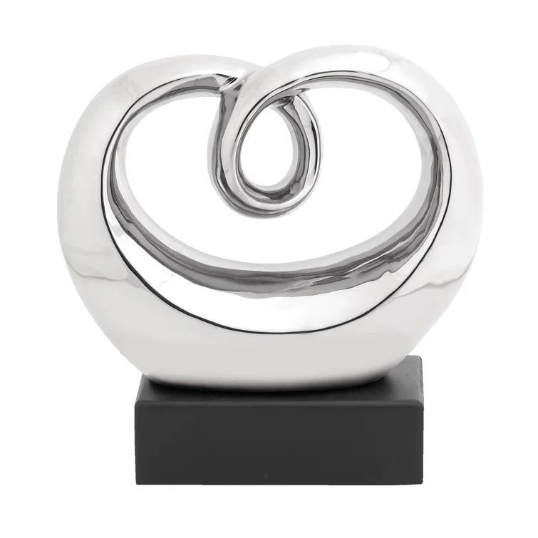 Wrought Studio™ Allye Ceramic Swirl Abstract Decorative Silver Sculpture with Black Base
