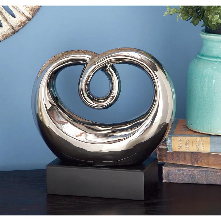 Wrought Studio™ Allye Ceramic Swirl Abstract Decorative Silver Sculpture with Black Base