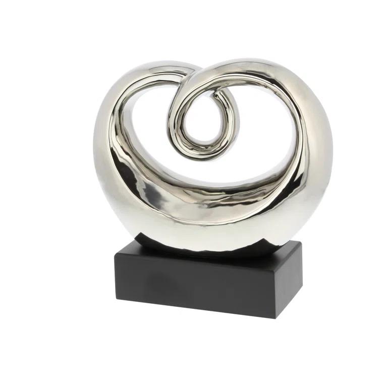 Wrought Studio™ Allye Ceramic Swirl Abstract Decorative Silver Sculpture with Black Base