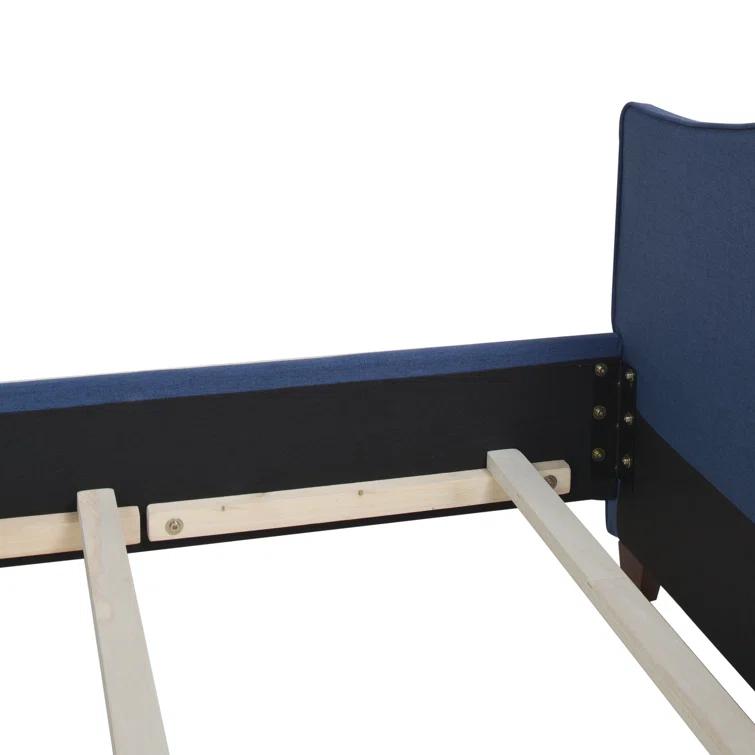 Coleman Upholstered Wingback Bed