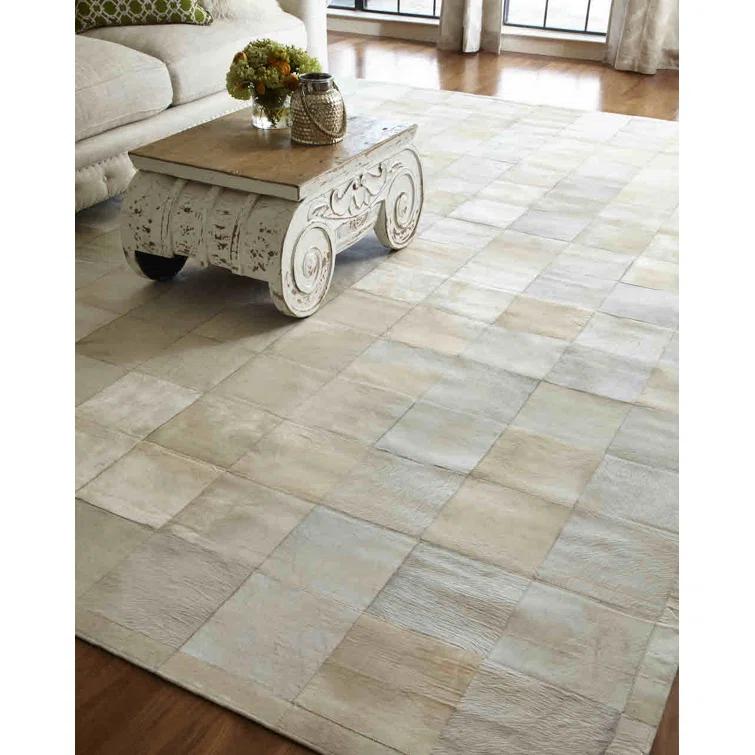 Exquisite Rugs Natural Hide Hand Stitched Leather Hide on Felt White Area Rug & Reviews | Wayfair