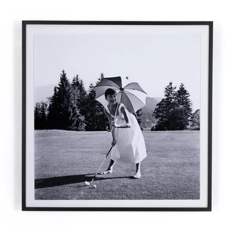 Golfing Hepburn Framed Print