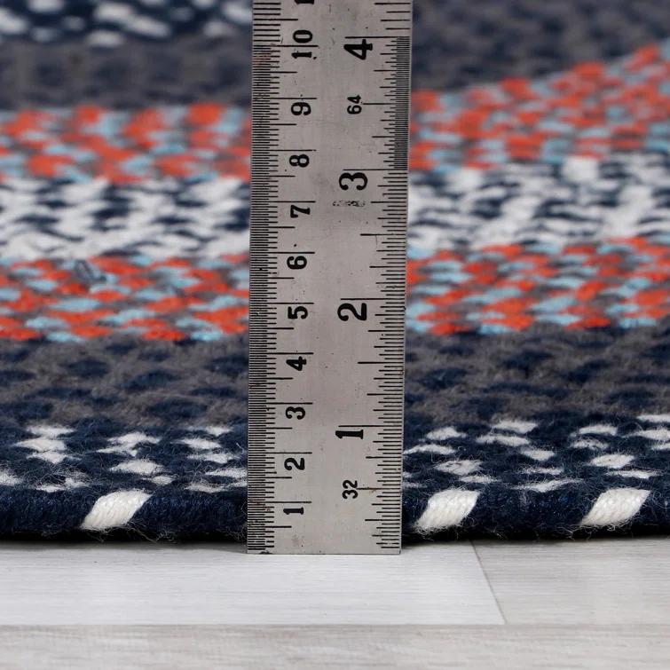 Enika Hand Braided Red/Blue Area Rug