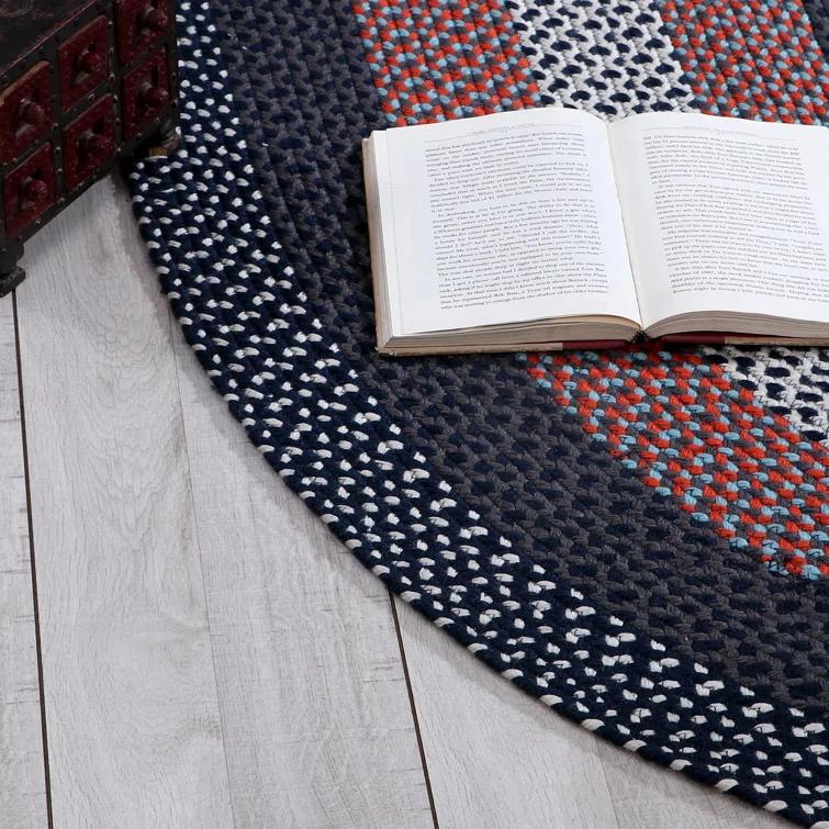 Enika Hand Braided Red/Blue Area Rug