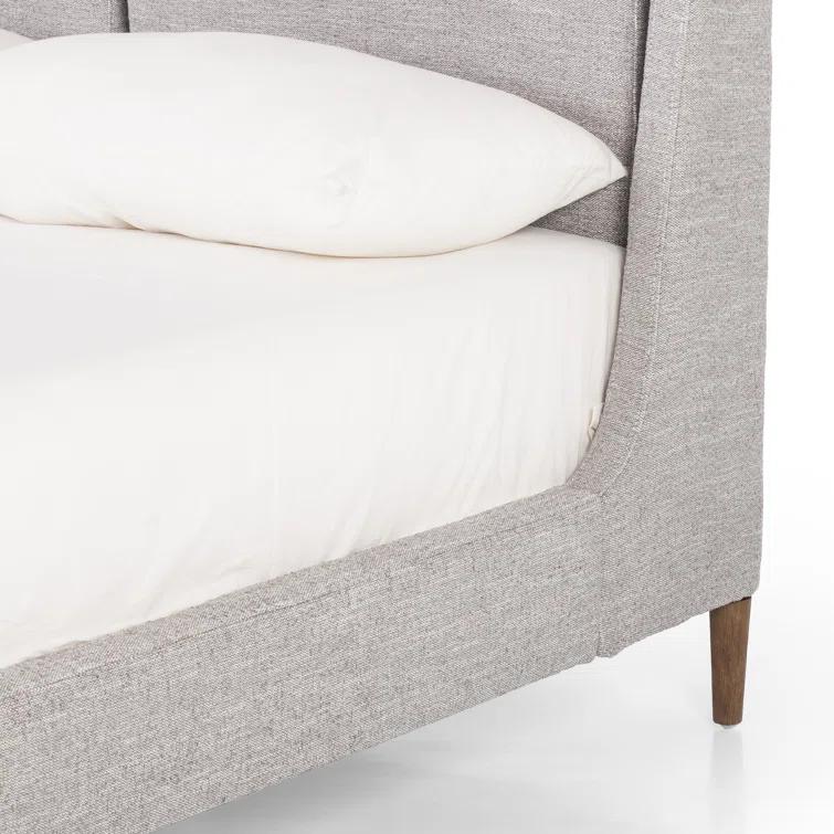 Gray Upholstered Queen Bed with Tapered Headboard and Wood Legs
