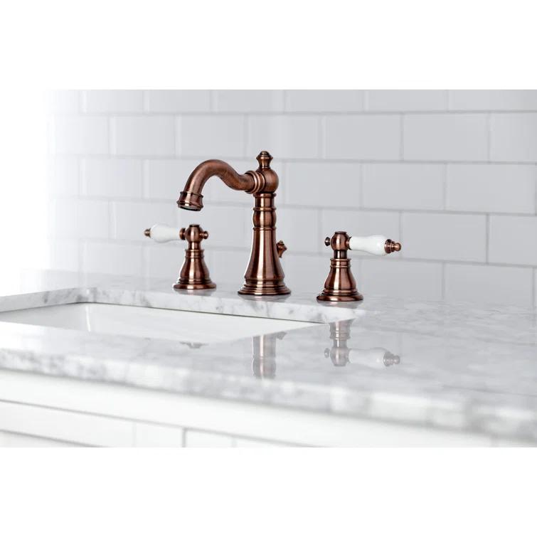 Kingston Brass American Patriot Two-Handle 3-Hole Deck Mount Widespread Bathroom Faucet with Pop-Up Drain