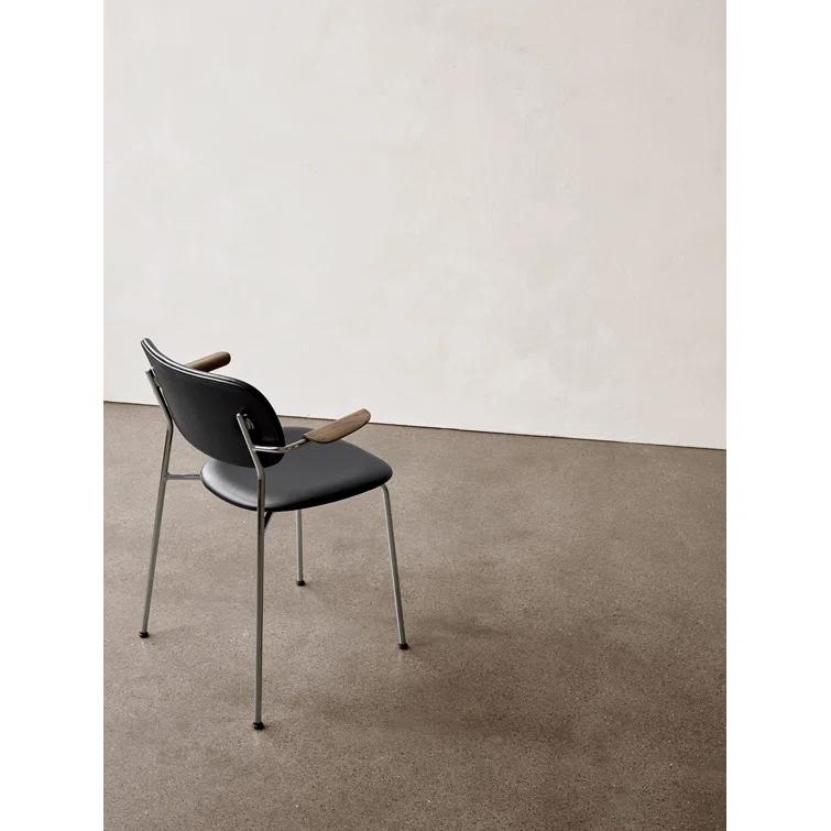 Cozy Minimalist Black Leather and Chrome Dining Chair with Armrests