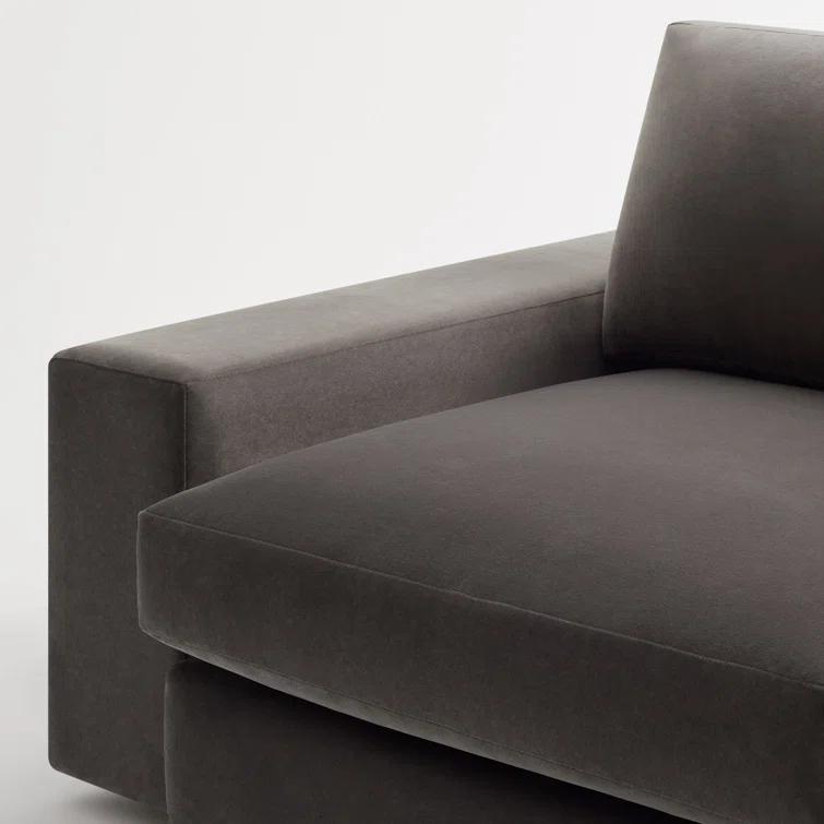 Kelso Blue Velvet L-Shaped Sofa with Removable Cushions and Wood Accents