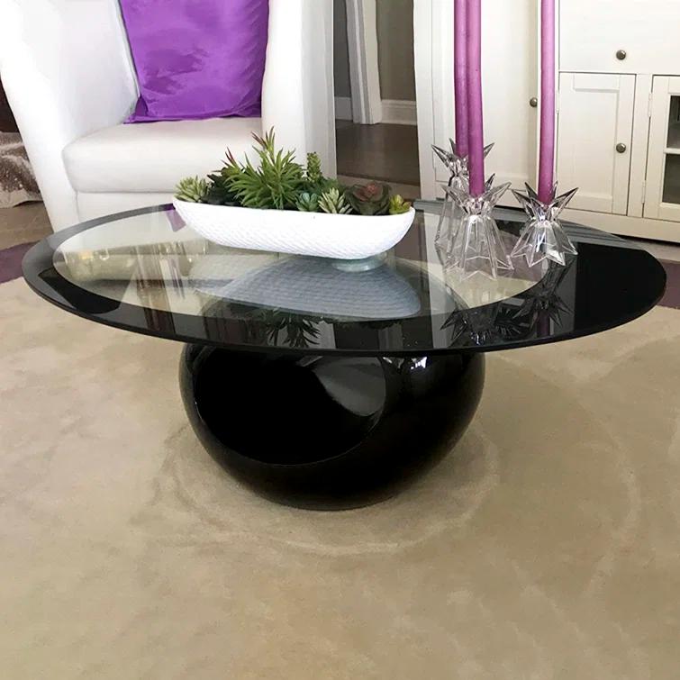 Orren Ellis Glass Top Coffee Table