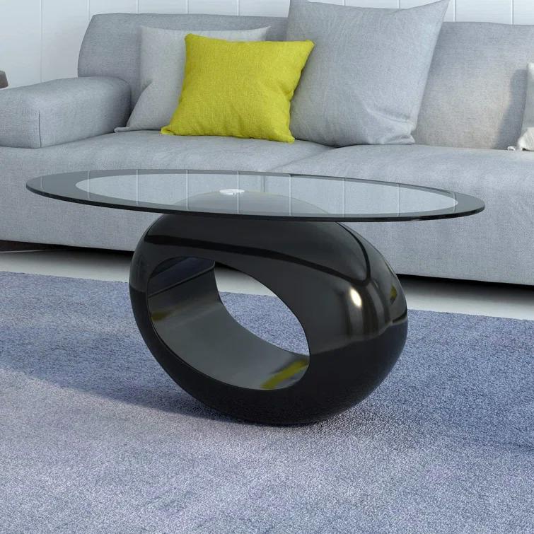 Orren Ellis Glass Top Coffee Table