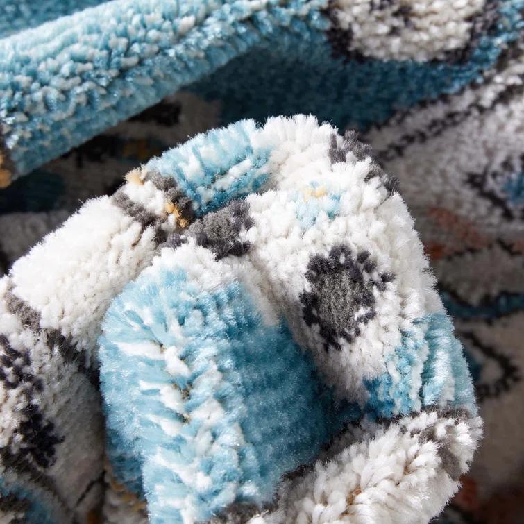 Espinal Oriental Blue/Ivory Area Rug