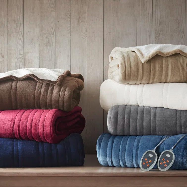 Woolrich Heated Plush to Berber Blanket