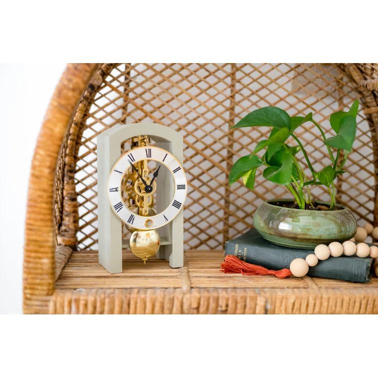 Gray and Gold Mechanical Table Clock with Open Design