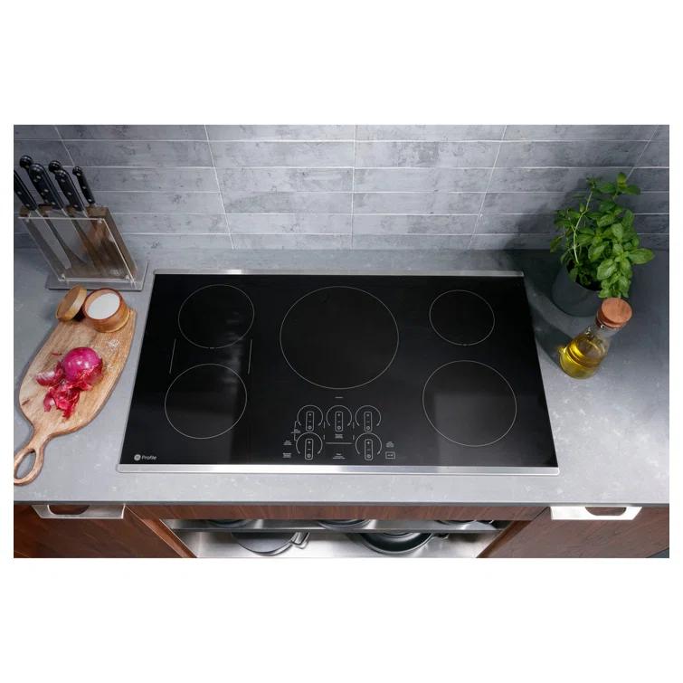 GE Profile™ PHP7030DTBB 29.75" Induction Cooktop with 4 Elements