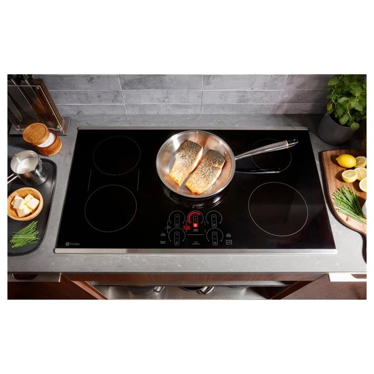 GE Profile™ PHP7030DTBB 29.75" Induction Cooktop with 4 Elements