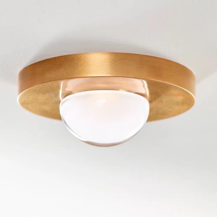 Ebell Modern LED Flush Mount in Natural Brass with Domed Glass