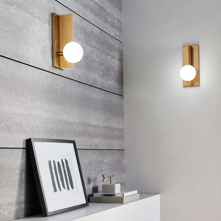 Orbel Geometric Aged Brass Wall Sconce with Frosted Glass Sphere