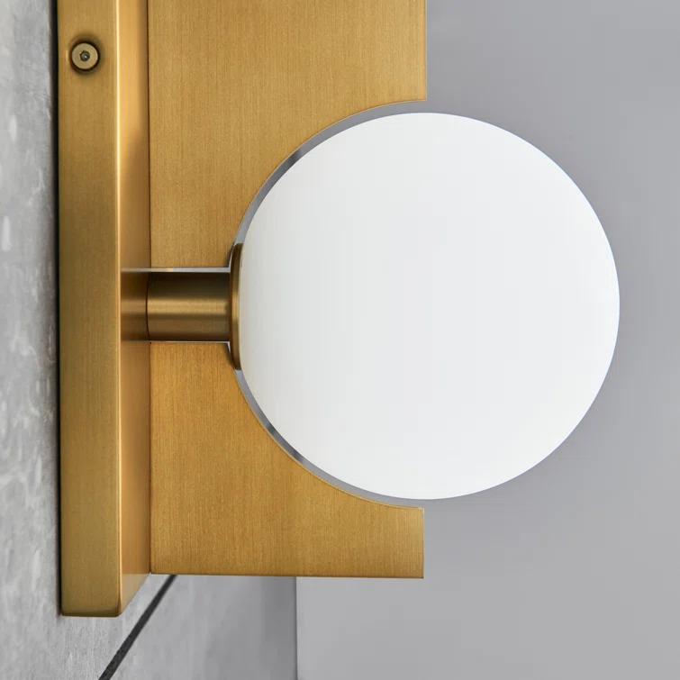 Orbel Geometric Aged Brass Wall Sconce with Frosted Glass Sphere
