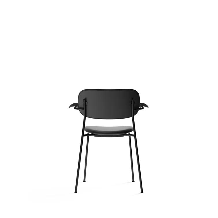 Cozy Minimalist Black Leather and Chrome Dining Chair with Armrests